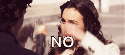 Woman Holding Man's Hand Saying No GIF
