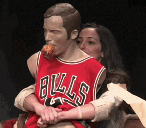 Woman Holding Mannequin In Red Bulls Jersey GIF