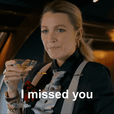 Woman Holding Martini Glass Saying I Missed You GIF
