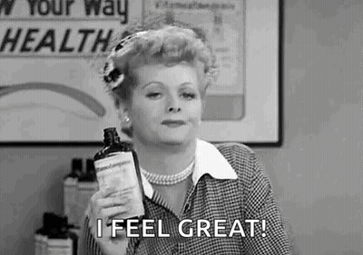 Woman Holding Medicine Bottle Saying I Feel Great! GIF