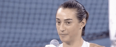Woman Holding Microphone And Smiling GIF