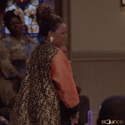Woman Holding Microphone At Stained Glass Window Juju GIF