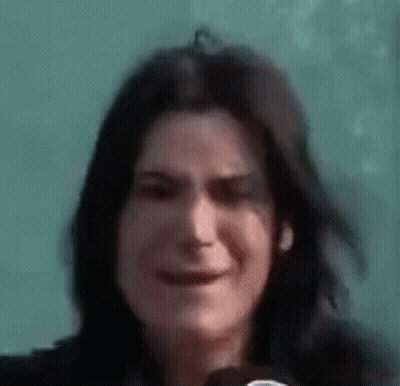 Woman Holding Microphone Close Up GIF