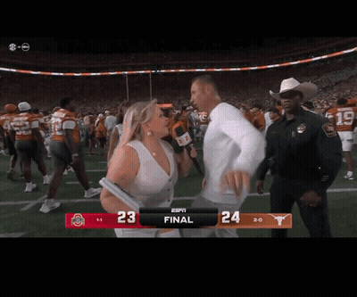 Woman Holding Microphone In Front Of Scoreboard Saying Final GIF