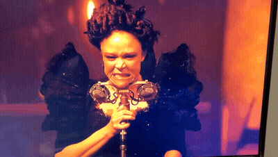 Woman Holding Microphone Making Face GIF