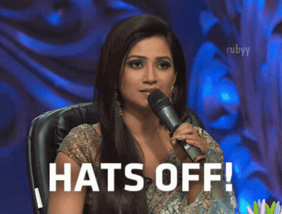 Woman Holding Microphone Saying Hats Off GIF