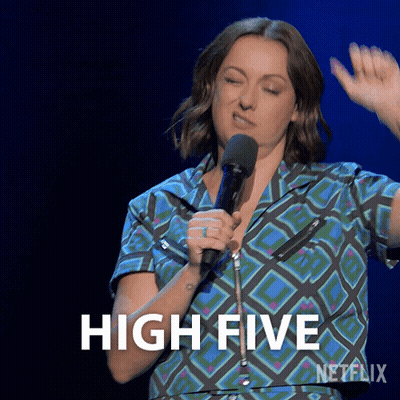 Woman Holding Microphone Saying High Five GIF