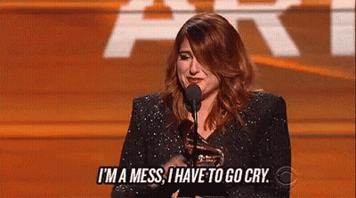 Woman Holding Microphone Saying I'm A Mess GIF