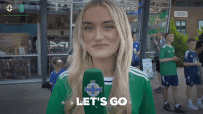 Woman Holding Microphone Saying Let's Go On It GIF
