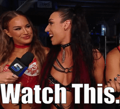 Woman Holding Microphone Saying Watch This GIF