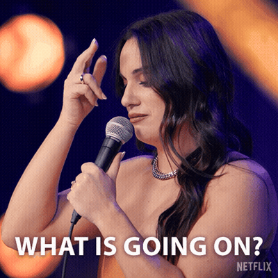 Woman Holding Microphone Saying What Is Going On GIF
