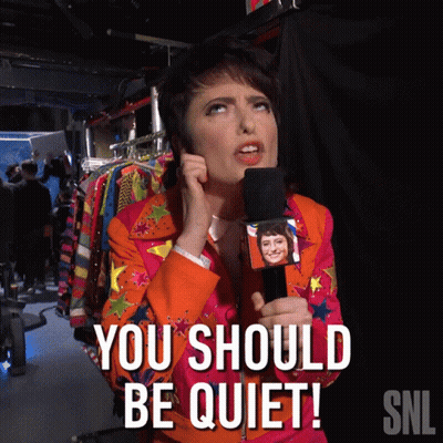 Woman Holding Microphone Saying You Should Be Quiet GIF