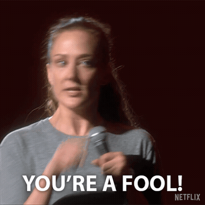 Woman Holding Microphone Says You're A Fool GIF