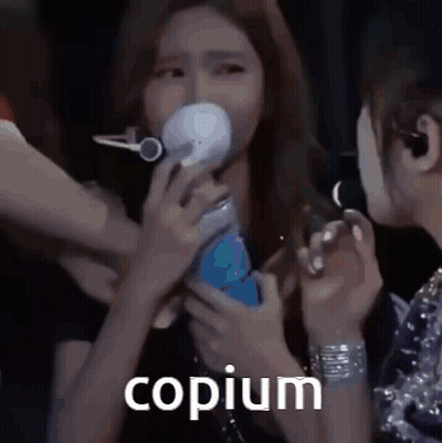 Woman Holding Microphone With Copium GIF