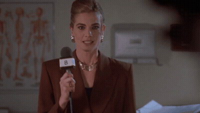 Woman Holding Microphone With Number 8 GIF