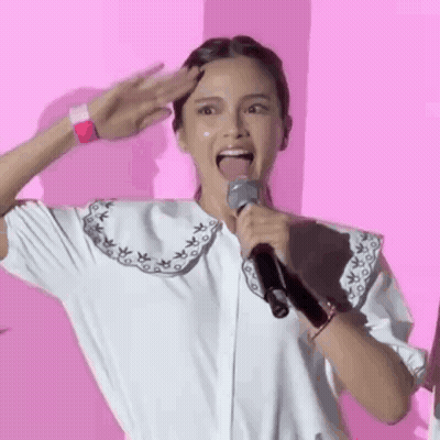 Woman Holding Microphone With Tongue Out GIF
