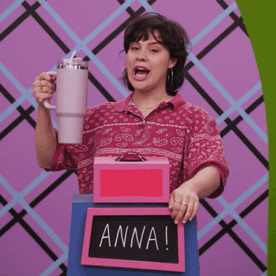 Woman Holding Mug And Box Saying Anna GIF