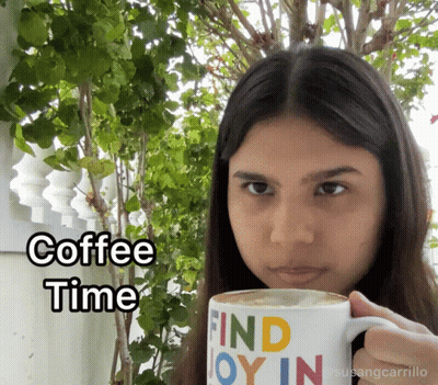 Woman Holding Mug Saying Find Joy In GIF