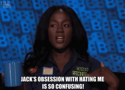 Woman Holding Mug Wearing Camp Combs Shirt GIF