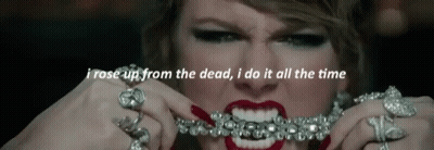 Woman Holding Necklace In Mouth Saying I Rose Up From The Dead GIF