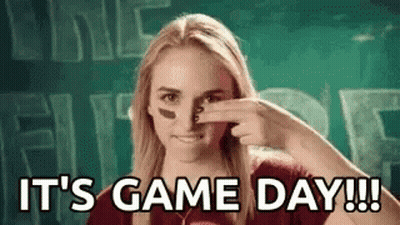 Woman Holding Nose In Front Of Game Day Sign GIF