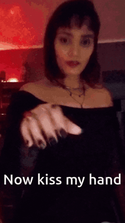 Woman Holding Out Hand Saying Now Kiss My Hand GIF