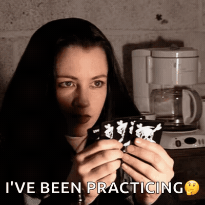 Woman Holding Paper Saying I've Been Practicing GIF