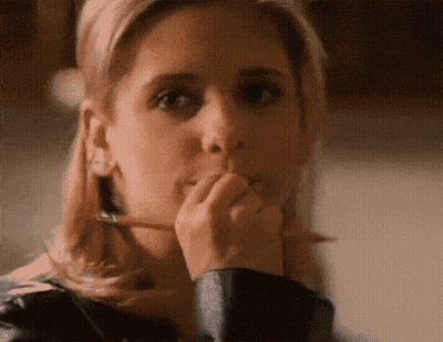 Woman Holding Pencil To Mouth GIF