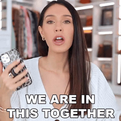 Woman Holding Phone Saying We Are In This Together GIF
