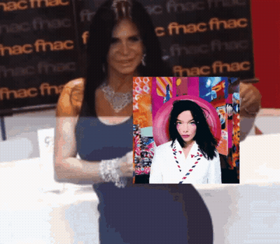 Woman Holding Picture In Front Of Fnac Sign GIF
