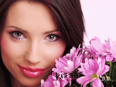 Woman Holding Pink Flowers With Kisses GIF
