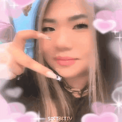 Woman Holding Pink Heart GIF