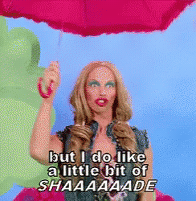 Woman Holding Pink Umbrella Saying But I Do Like A Little Bit Of Shaaaaade GIF