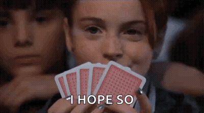 Woman Holding Playing Cards Saying I Hope So GIF
