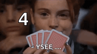 Woman Holding Playing Cards Saying Ysee GIF