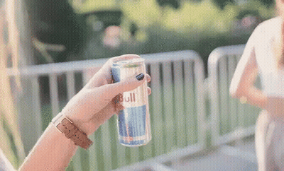 Woman Holding Red Bull Can GIF
