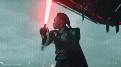 Woman Holding Red Lightsaber GIF