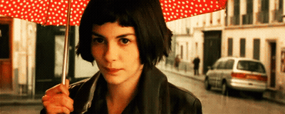 Woman Holding Red Polka Dot Umbrella GIF