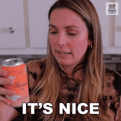 Woman Holding Reese's Ice Cream Says It's Nice GIF