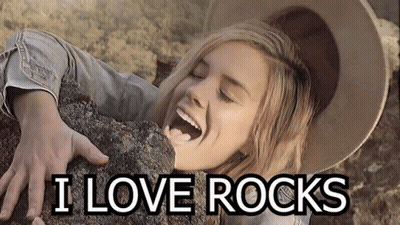 Woman Holding Rock Saying I Love Rocks GIF