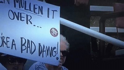 Woman Holding Sign I'm A Bad Dawg GIF