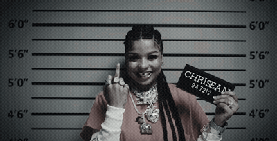 Woman Holding Sign Saying Chrisean GIF