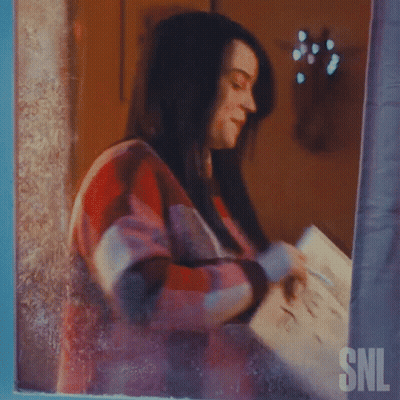 Woman Holding Sign Saying I Would You Ke To Come To Dinner GIF