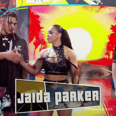Woman Holding Sign Saying Jaida Parker GIF