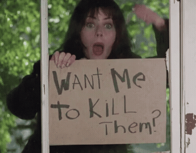 Woman Holding Sign Saying Want Me To Kill Them GIF