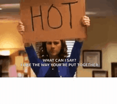 Woman Holding Sign Saying What Can I Say GIF