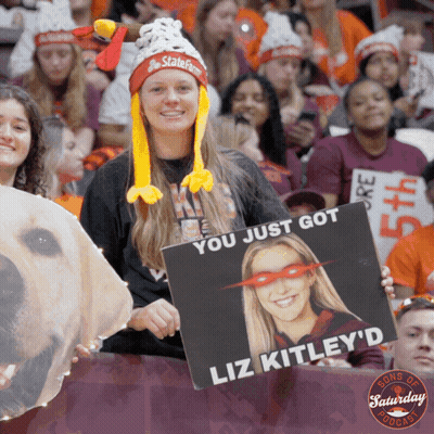 Woman Holding Sign You Just Got Liz Kitley D GIF
