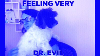 Woman Holding Small Dog With Feeling Very Dr. Evil GIF