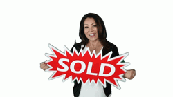 Woman Holding Sold Placard GIF