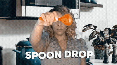 Woman Holding Spoon Drop GIF